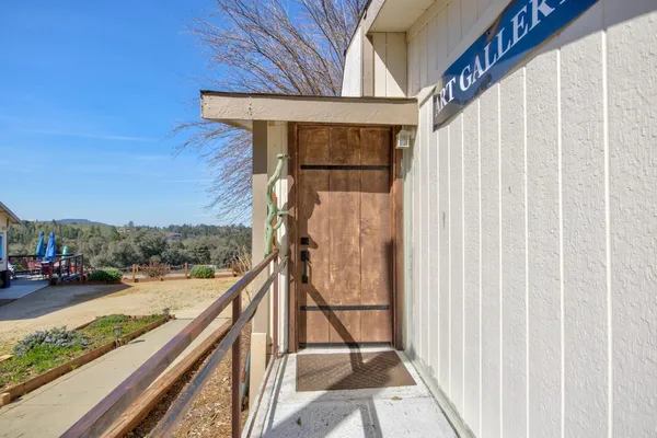 a kitchen with stainless steel appliances a refrigerator and a stove