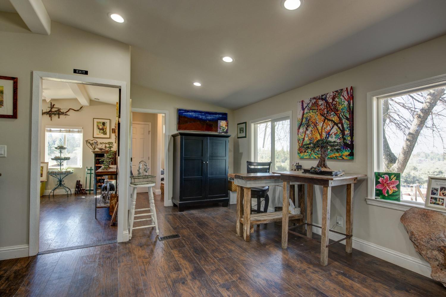 Undisclosed Address Somerset, CA 95684 - Photo 28 of 90 a view of a dining room with furniture window and wooden floor