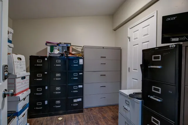 a swimming pool with outdoor seating and yard