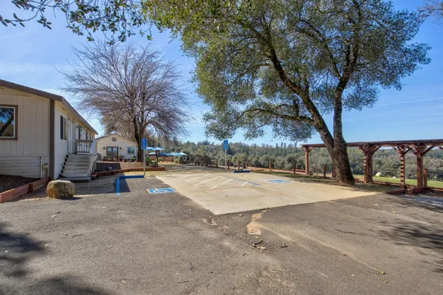 a view of a swimming pool with a lake view