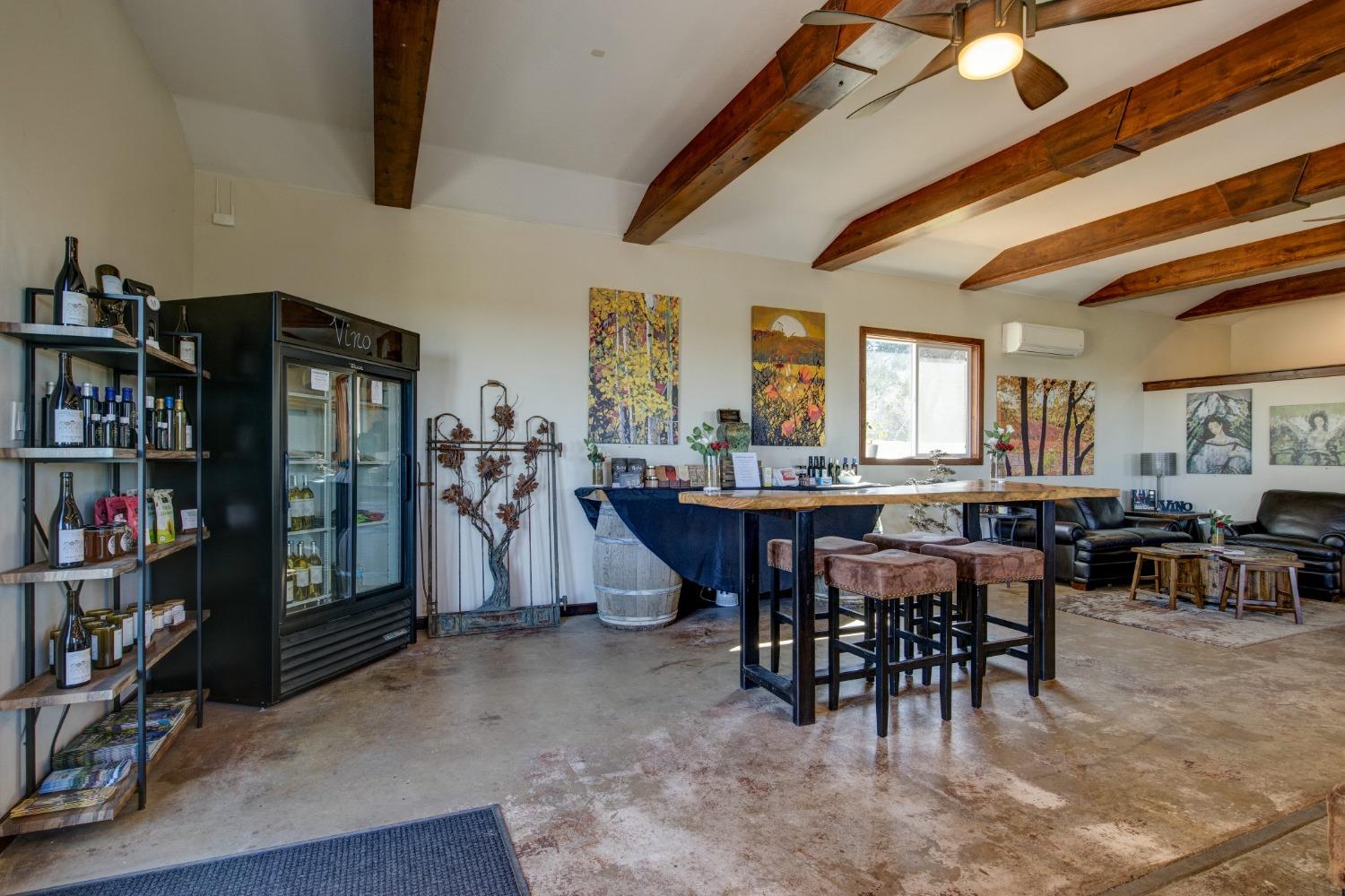 Undisclosed Address Somerset, CA 95684 - Photo 7 of 90 a view of a dining room with furniture and chandelier