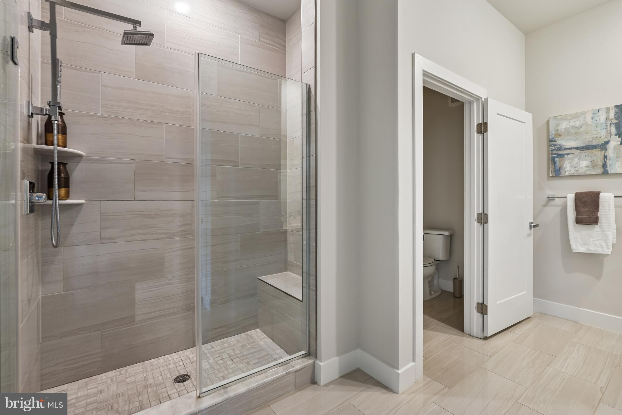 1761 Old Meadow Road, Unit 517 McLean, VA 22102 - Photo 16 of 39 a bathroom with a shower