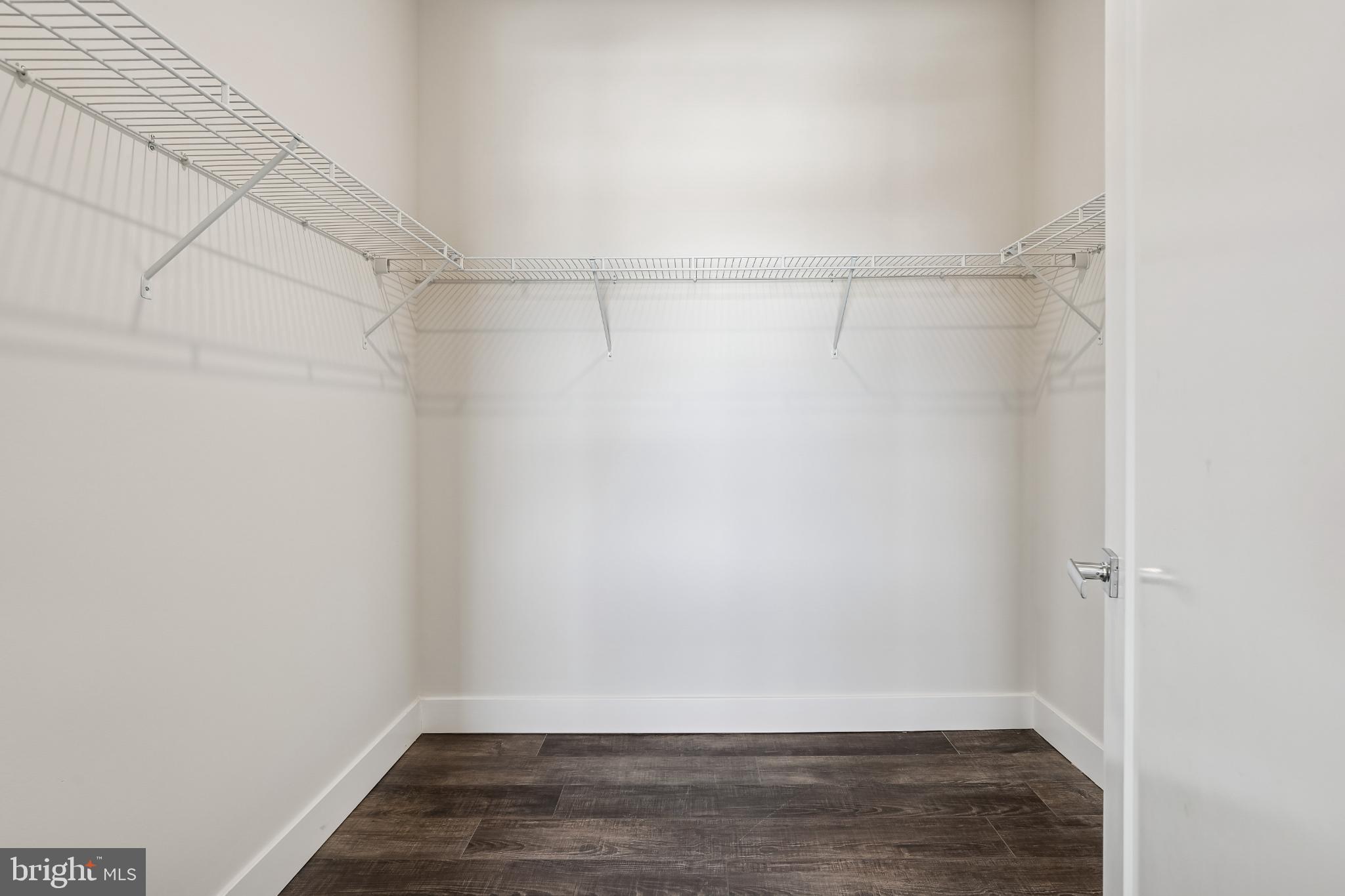 1761 Old Meadow Road, Unit 517 McLean, VA 22102 - Photo 22 of 39 a view of a room with wooden floor