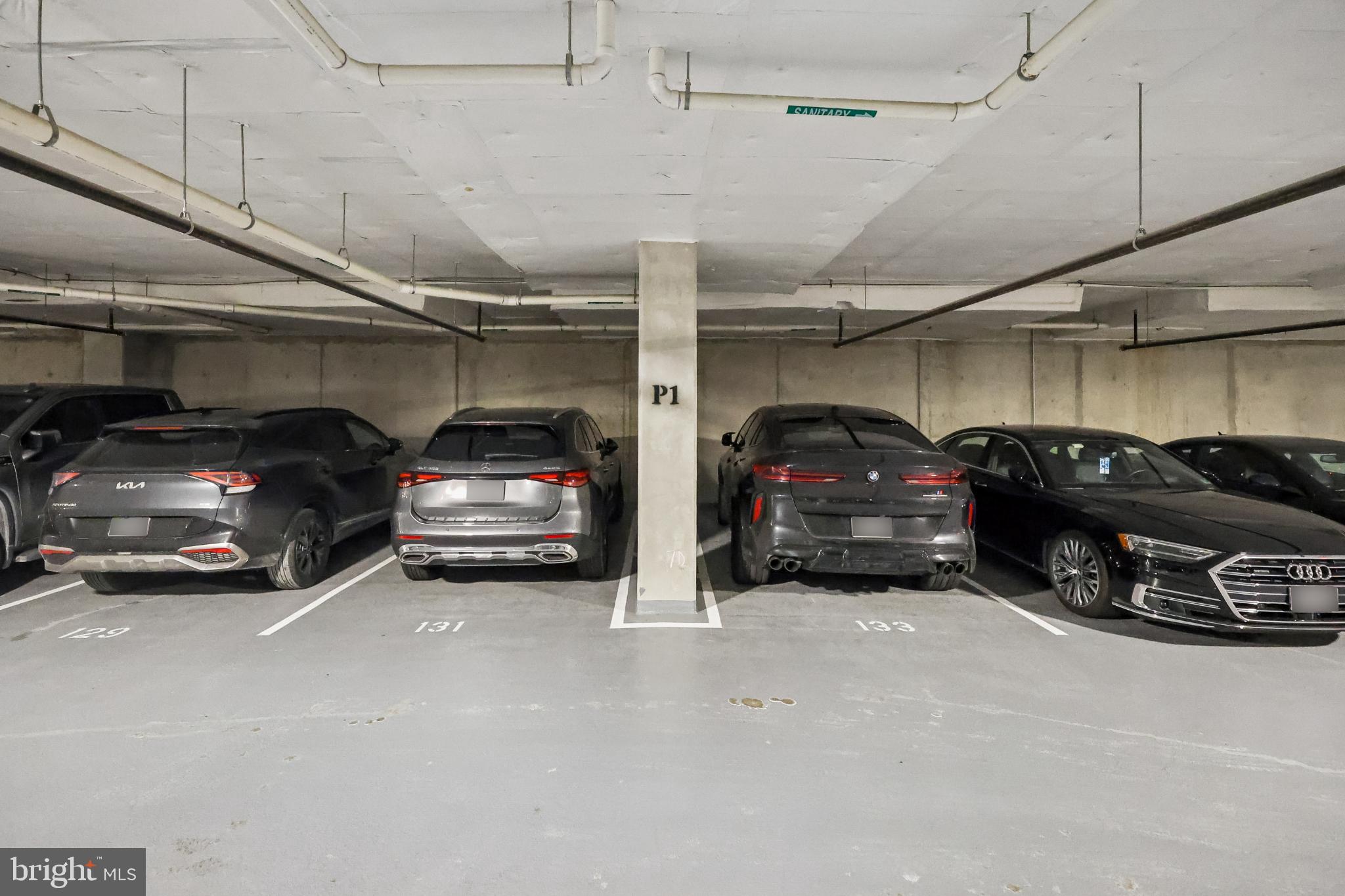 1761 Old Meadow Road, Unit 517 McLean, VA 22102 - Photo 29 of 39 a car parked in a garage
