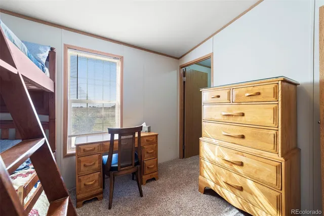 a view of a livingroom with furniture
