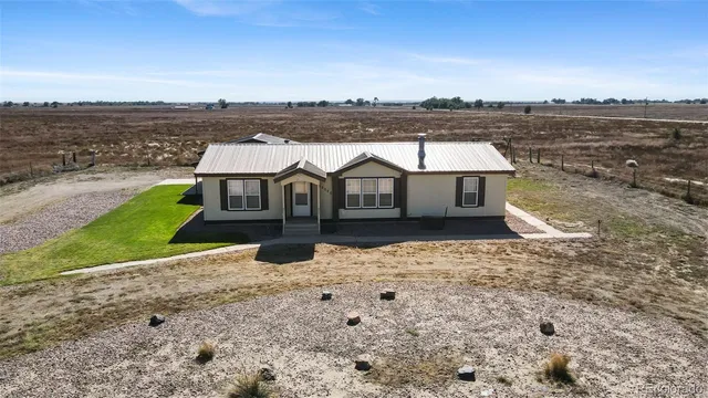 a view of a terrace with a lake