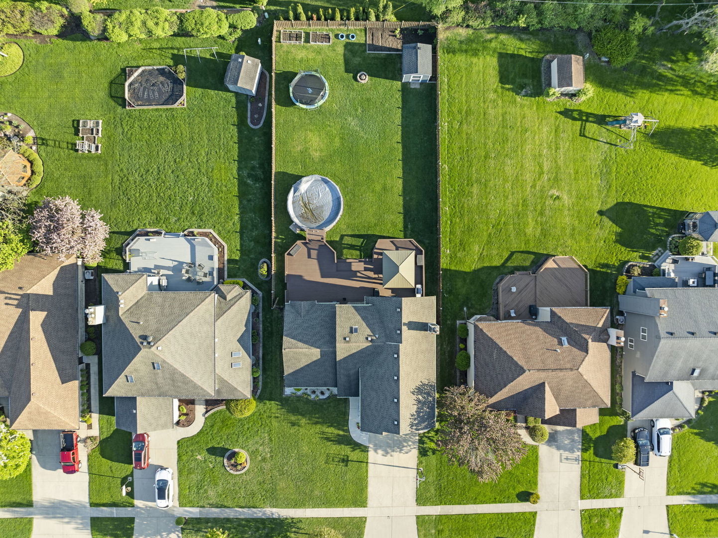 164 Wilcox Drive Bartlett, IL 60103 - Photo 6 of 8 an aerial view of a house yard swimming pool and tennis court