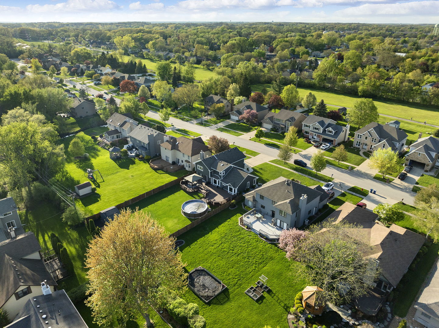 164 Wilcox Drive Bartlett, IL 60103 - Photo 7 of 8 an aerial view of a house with a garden