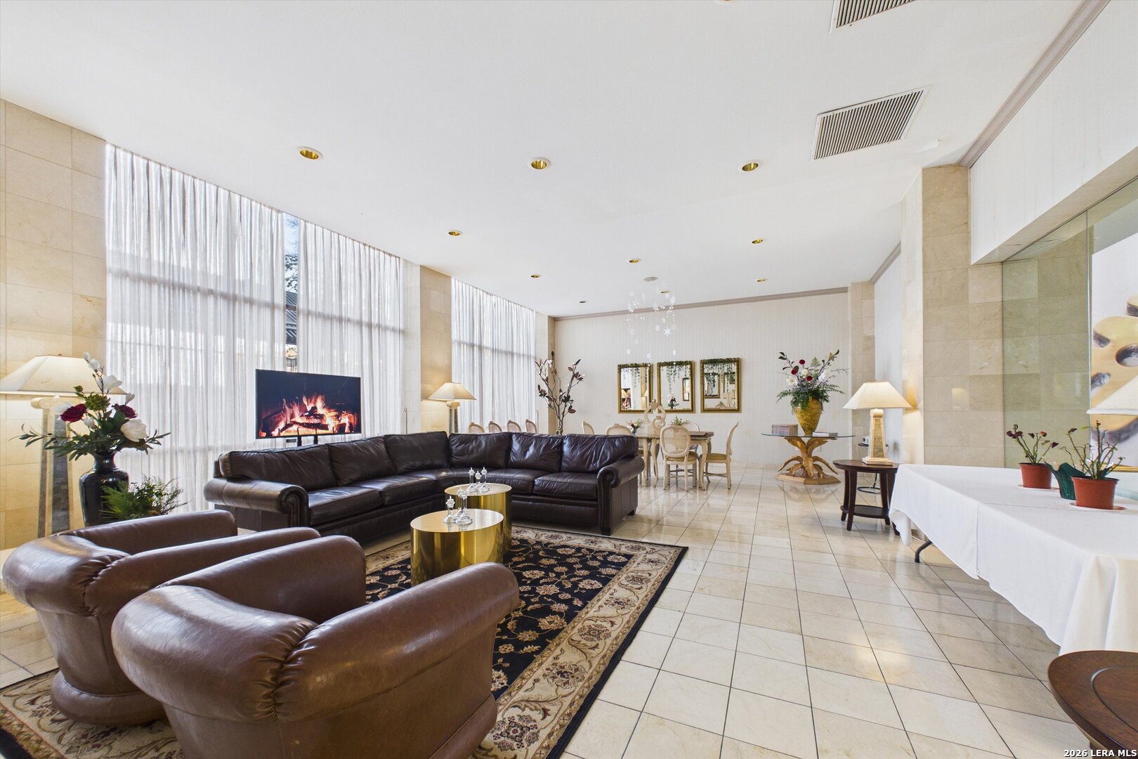 7701 Wurzbach Road, Unit 1803 San Antonio, TX 78229 - Photo 26 of 34 a living room with furniture