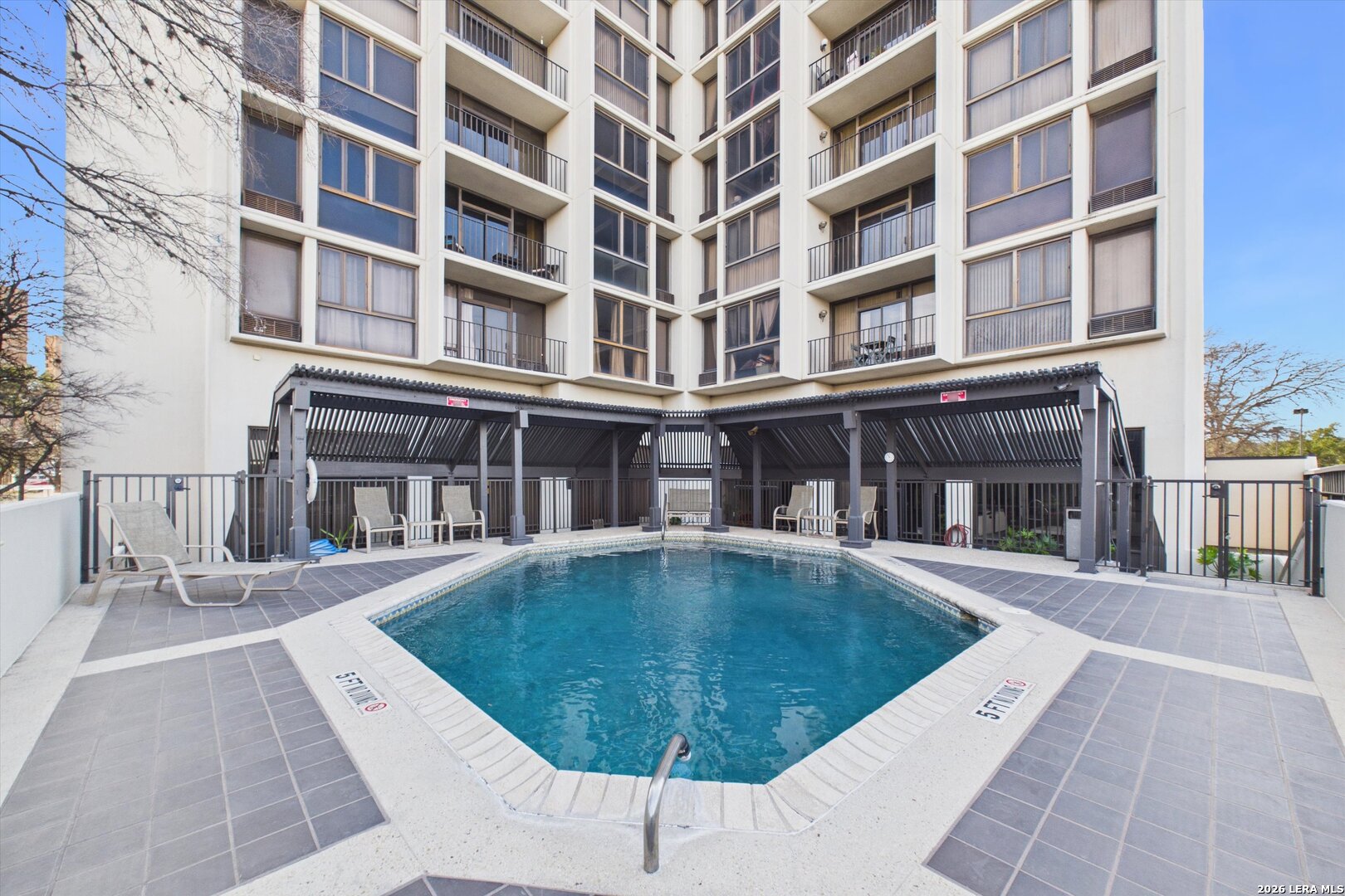 7701 Wurzbach Road, Unit 1803 San Antonio, TX 78229 - Photo 28 of 34 front view of a building with a fountain