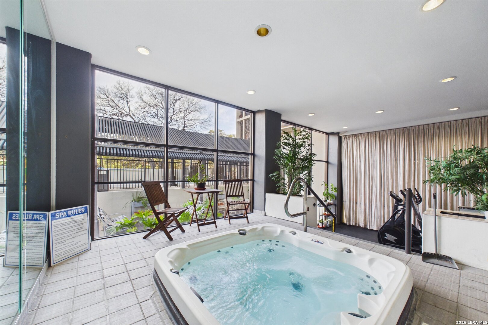 7701 Wurzbach Road, Unit 1803 San Antonio, TX 78229 - Photo 30 of 34 a very nice looking room with a large window and furniture