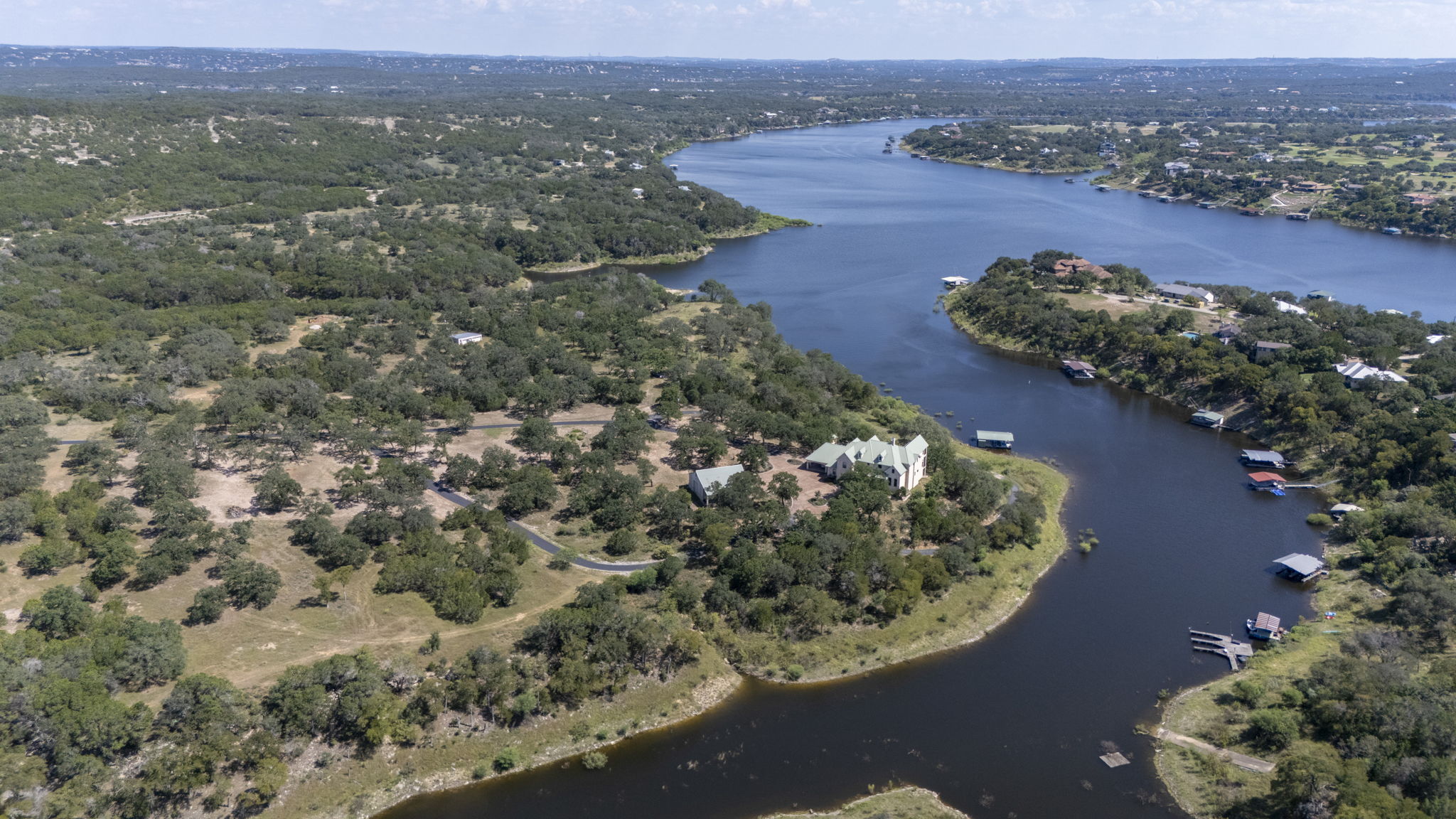 Tbd Singleton Road Marble Falls, TX 78654 - Photo 5 of 40 Aerial view showing Lake Travis and wooded areas of property