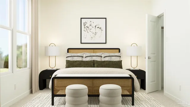 a bedroom with a bed and a window