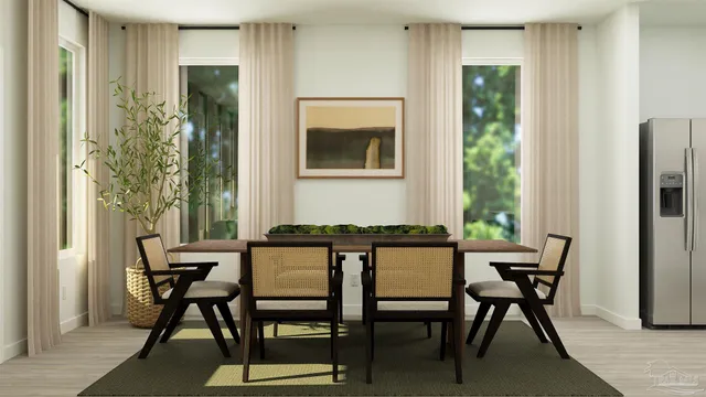 a view of a dining room with furniture window and outside view