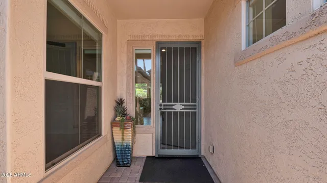 a view of a hallway with a livingroom and a dinning room