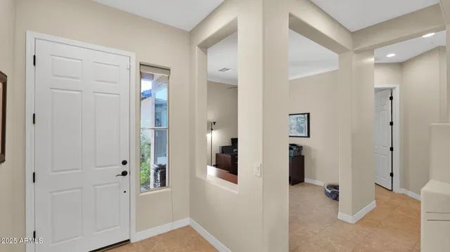 a workspace with furniture and a window