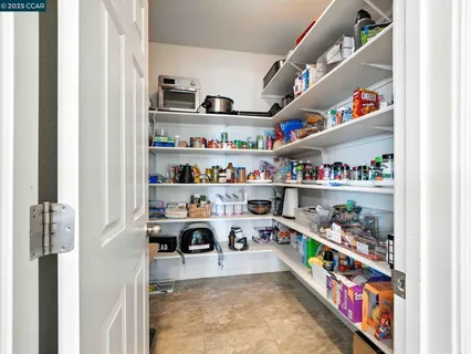 a living room with fireplace furniture and a flat screen tv