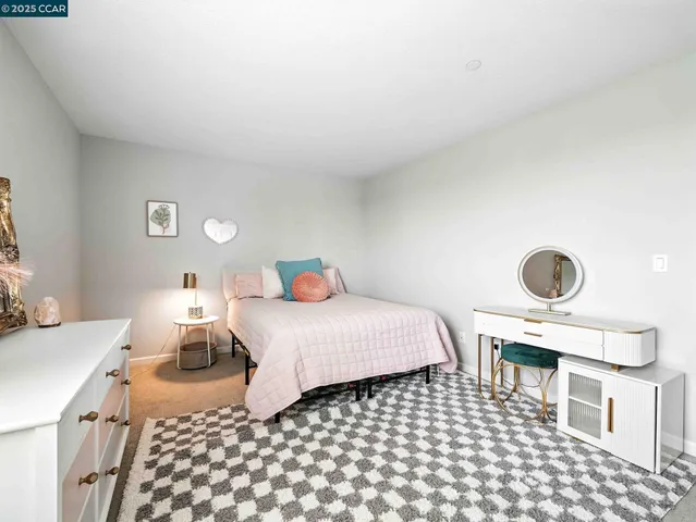 a balcony with view of living room