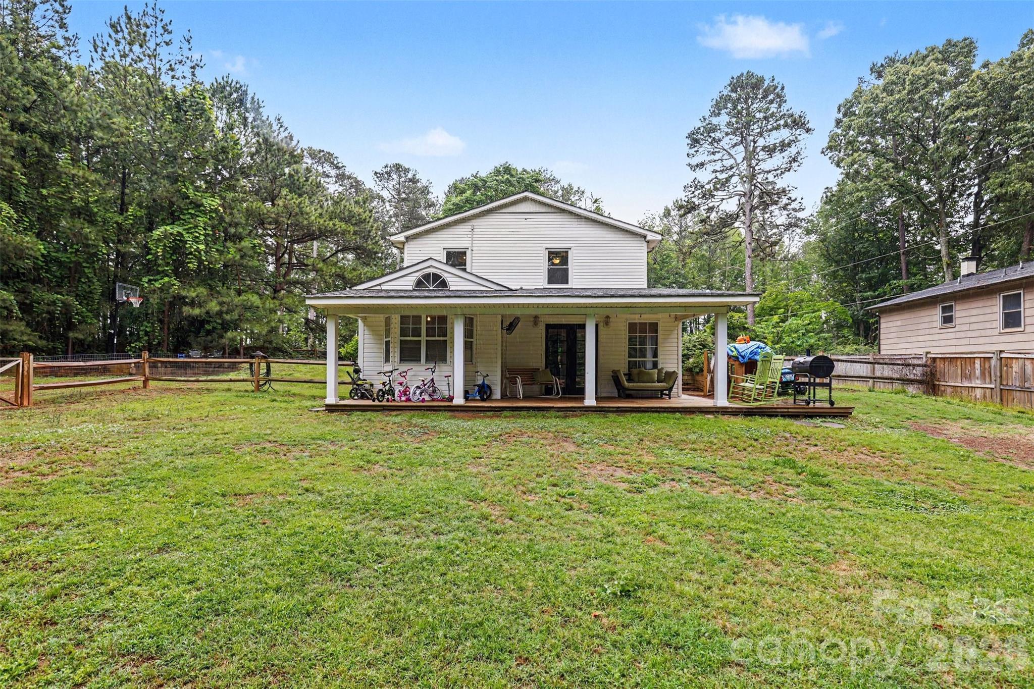 184 Canal Road Belmont, NC 28012 - Photo 7 of 39 a front view of a house with a garden