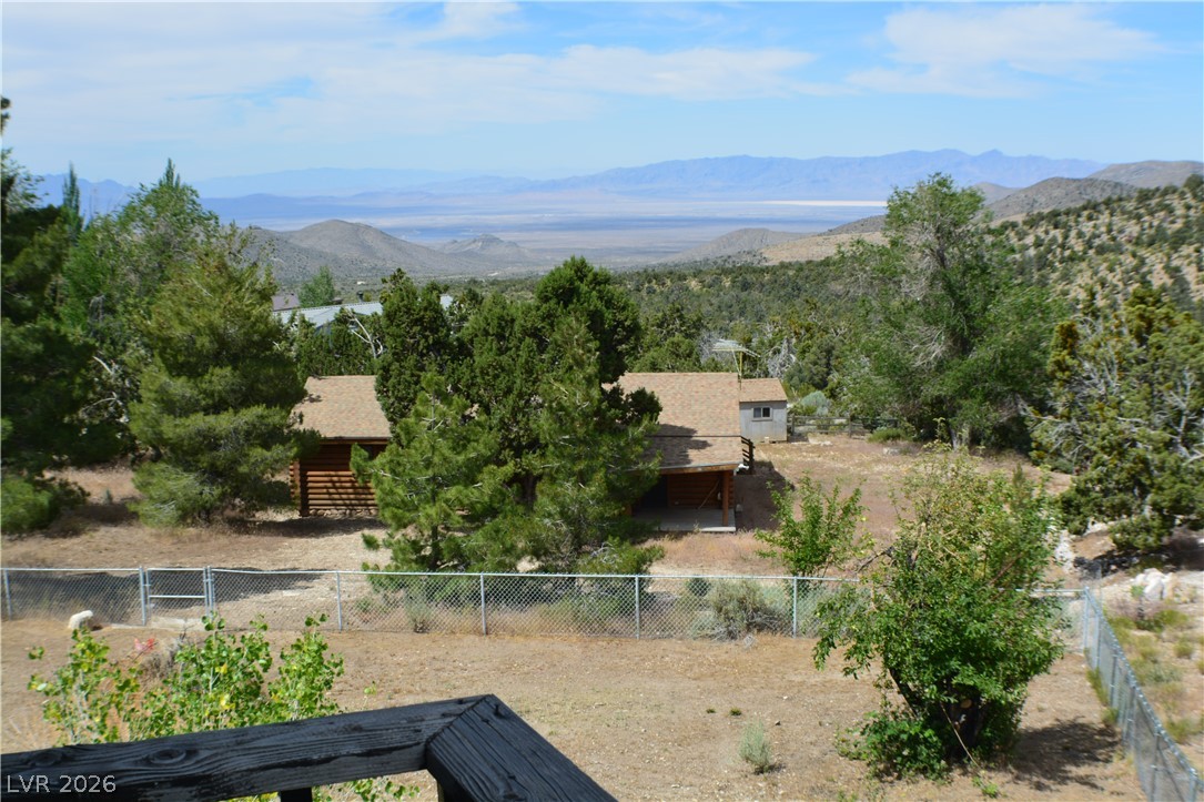 1321 Trout Canyon Road Las Vegas, NV 89124 - Photo 32 of 50 Panoramic mountain views from this expansive rural retreat, featuring multiple outbuildings.