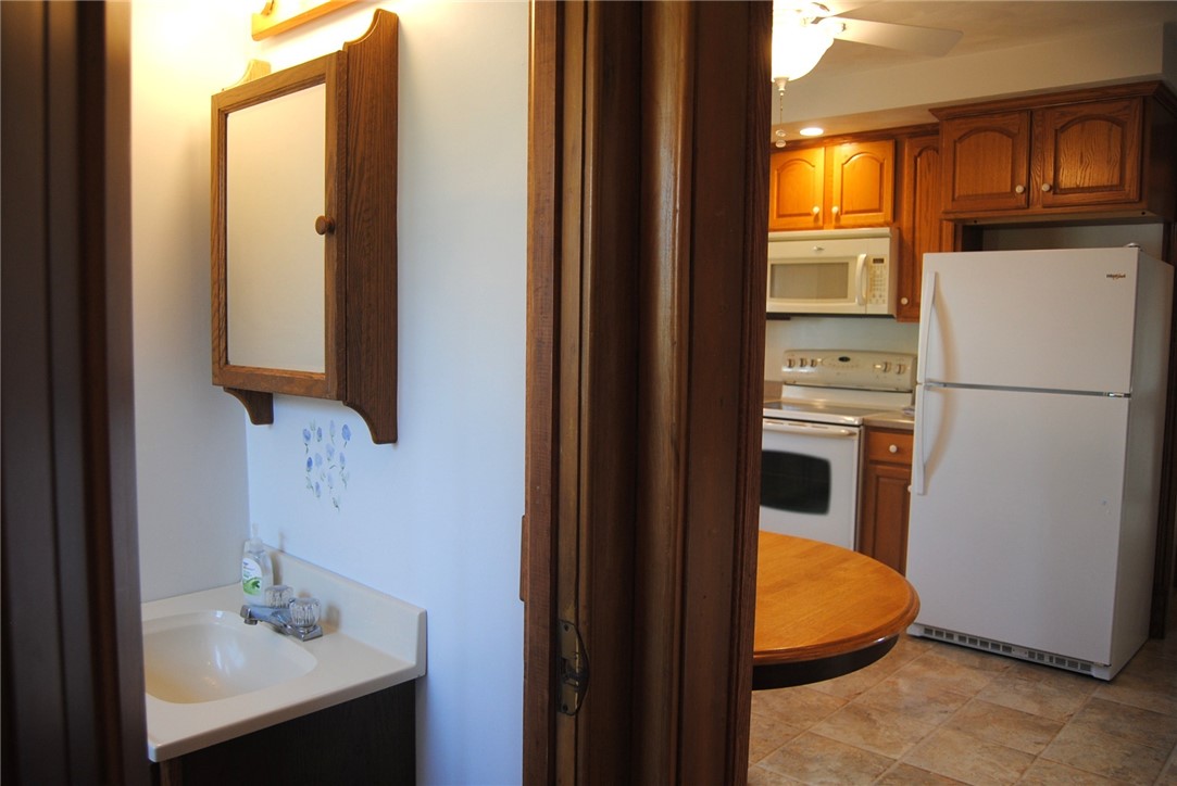 19 Spruce Avenue Kane, PA 16735 - Photo 12 of 26 half bath off of kitchen at bottom of 2nd staircas