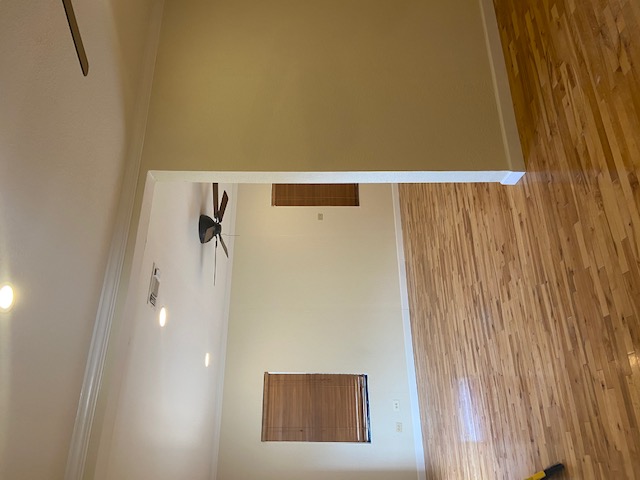 1034 Magnolia Street Lockhart, TX 78644 - Photo 7 of 12 Empty room with ceiling fan, ornamental molding, light wood finished floors, and recessed lighting