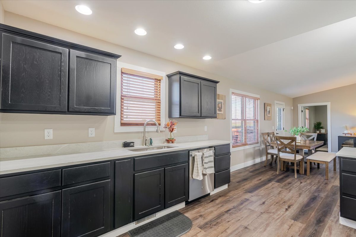 1388 East 2950 North Road Mansfield, IL 61854 - Photo 15 of 43 a kitchen with lots of counter top space sink and center island