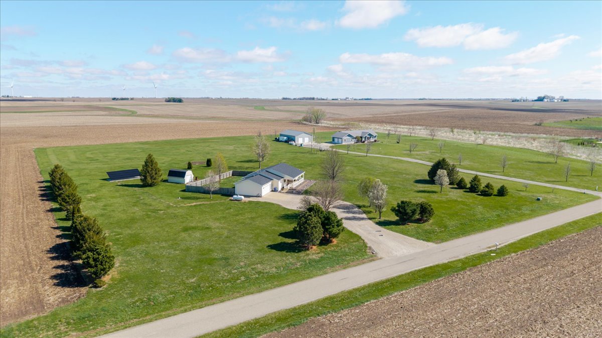 1388 East 2950 North Road Mansfield, IL 61854 - Photo 31 of 43 a view of a lake with a yard