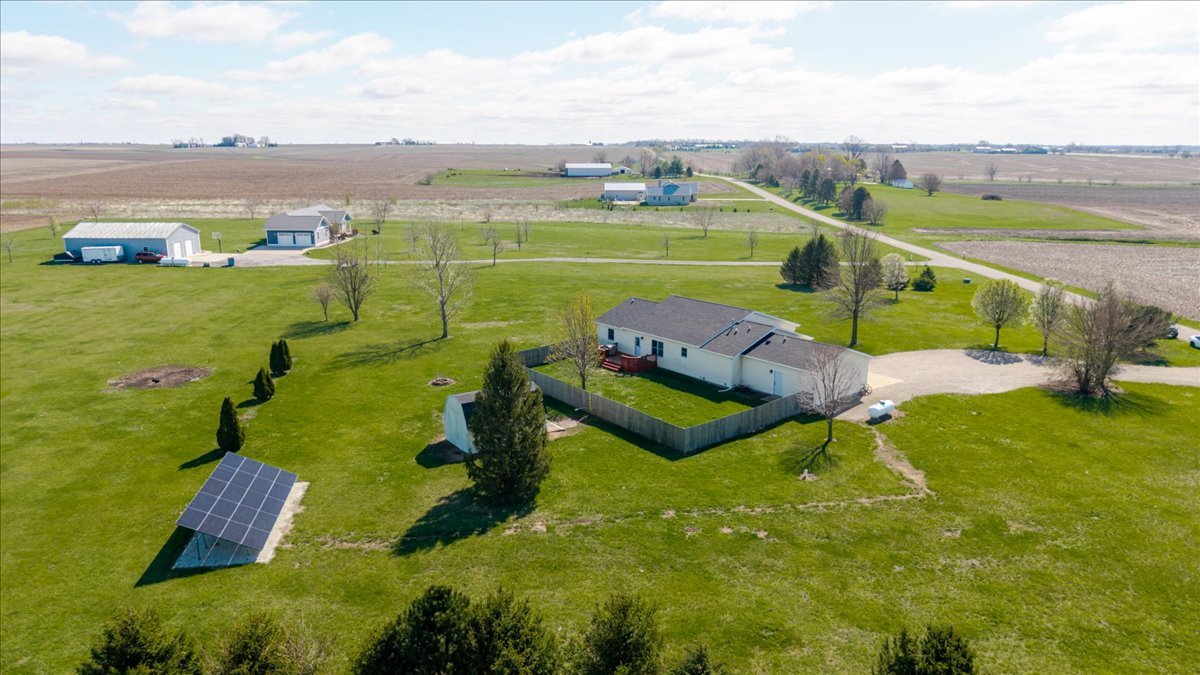 1388 East 2950 North Road Mansfield, IL 61854 - Photo 37 of 43 a view of a city with lawn chairs