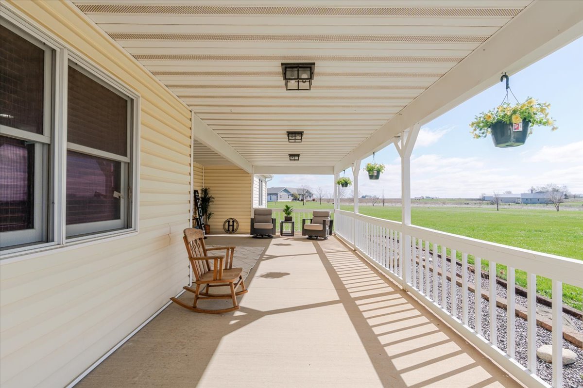 1388 East 2950 North Road Mansfield, IL 61854 - Photo 6 of 43 a view of a patio with wooden floor