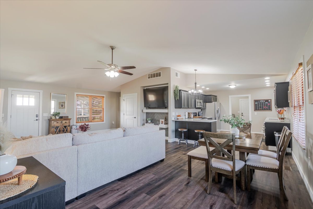 1388 East 2950 North Road Mansfield, IL 61854 - Photo 9 of 43 a view of a dining room with furniture window and wooden floor