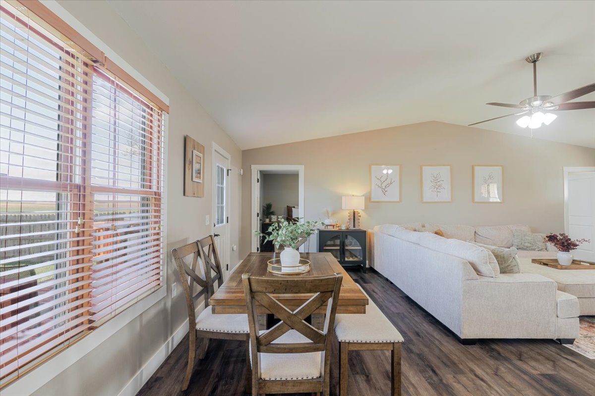 1388 East 2950 North Road Mansfield, IL 61854 - Photo 10 of 43 a view of a dining room with furniture window and wooden floor