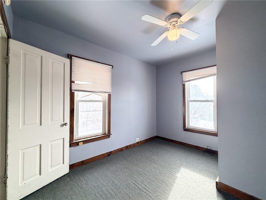 217 13th Street, Unit 2 Beaver Falls, PA 15010 - Photo 6 of 9 a view of an empty room with a window
