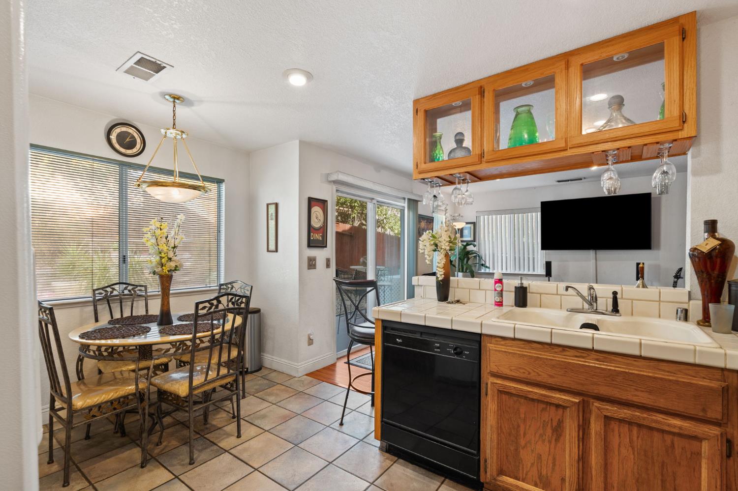 3941 Grey Livery Way Antelope, CA 95843 - Photo 8 of 28 a room with stainless steel appliances kitchen island granite countertop a sink and cabinets