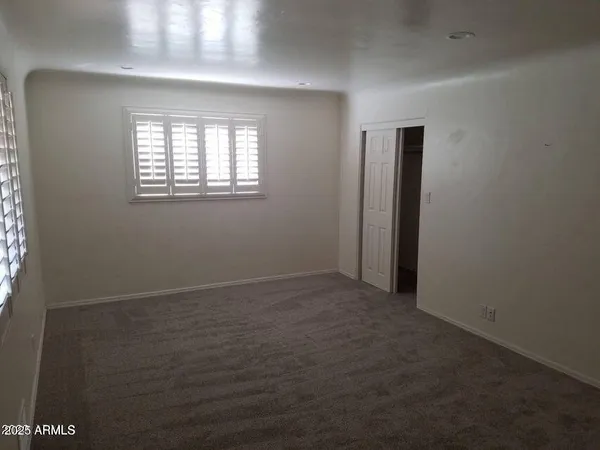 an empty room with a window