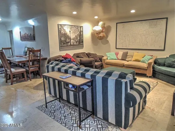 a kitchen with appliances a counter space and a window