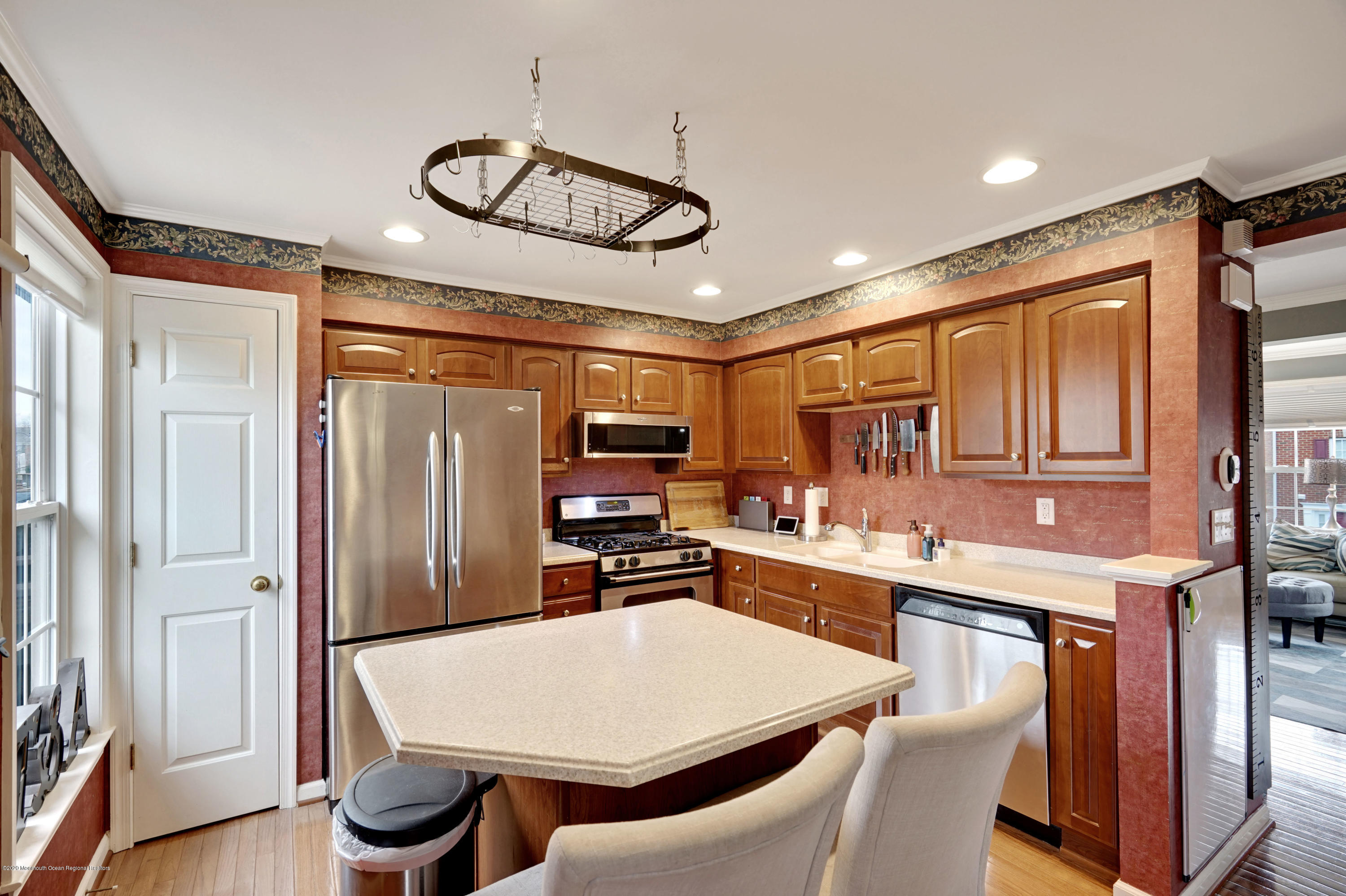 60 Saxton Road, Unit 87 Farmingdale, NJ 07727 - Photo 12 of 38 a kitchen with a table and chairs