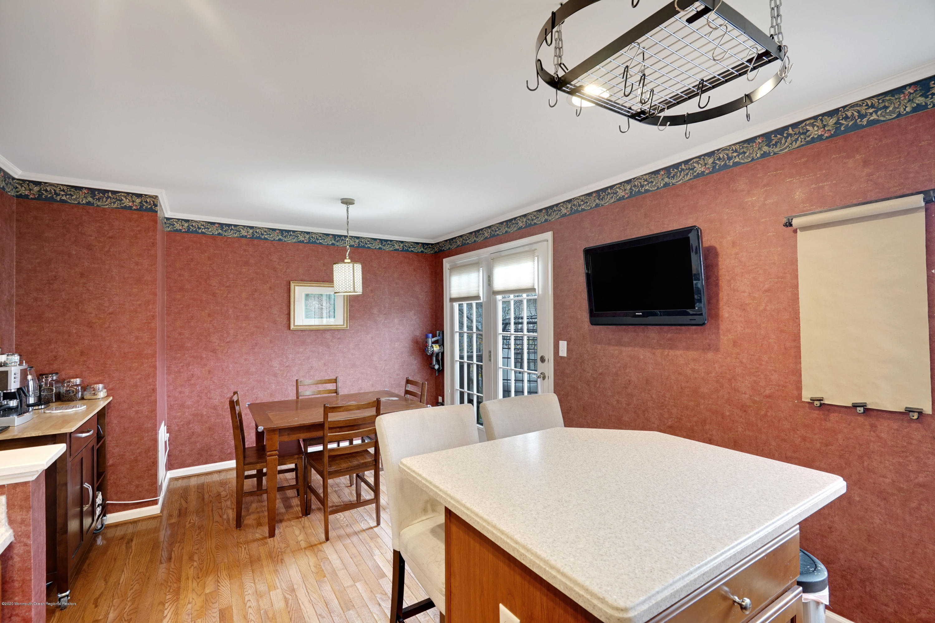 60 Saxton Road, Unit 87 Farmingdale, NJ 07727 - Photo 15 of 38 a view of a livingroom with furniture and a flat screen tv