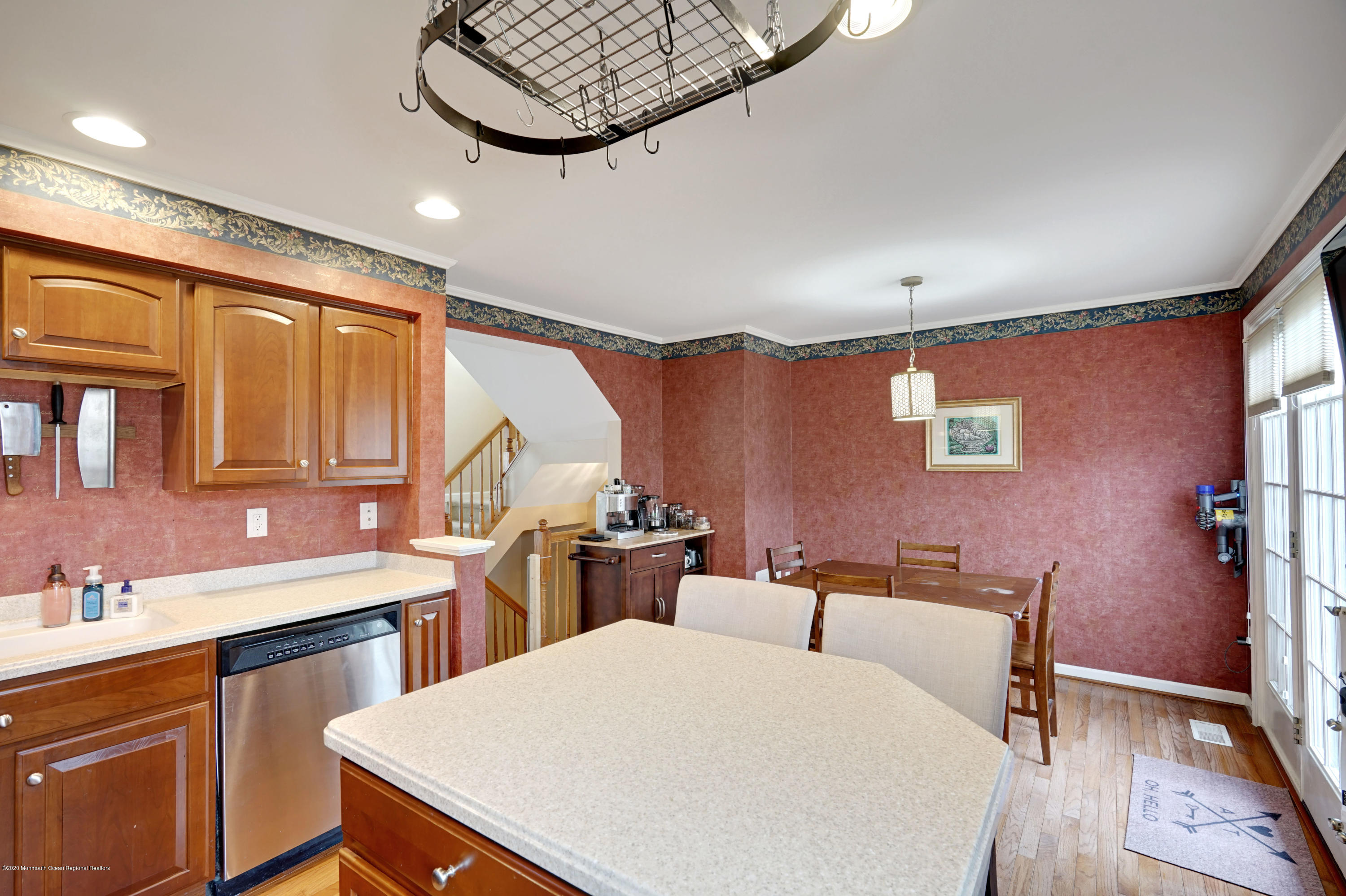 60 Saxton Road, Unit 87 Farmingdale, NJ 07727 - Photo 16 of 38 a large kitchen with a table and chairs in it