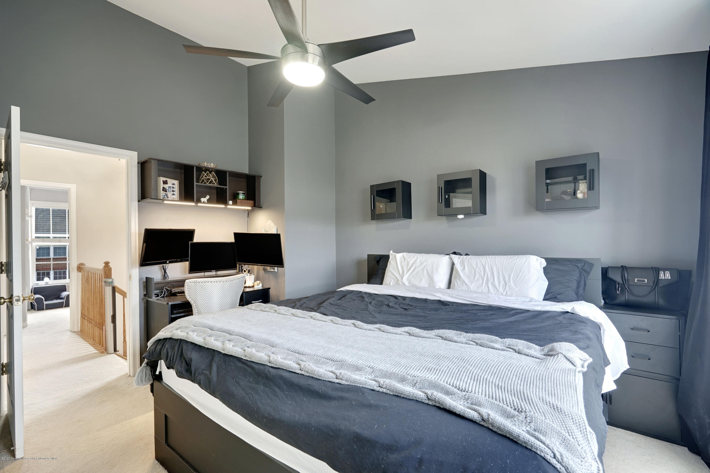 60 Saxton Road, Unit 87 Farmingdale, NJ 07727 - Photo 19 of 38 a bedroom with a bed and a table