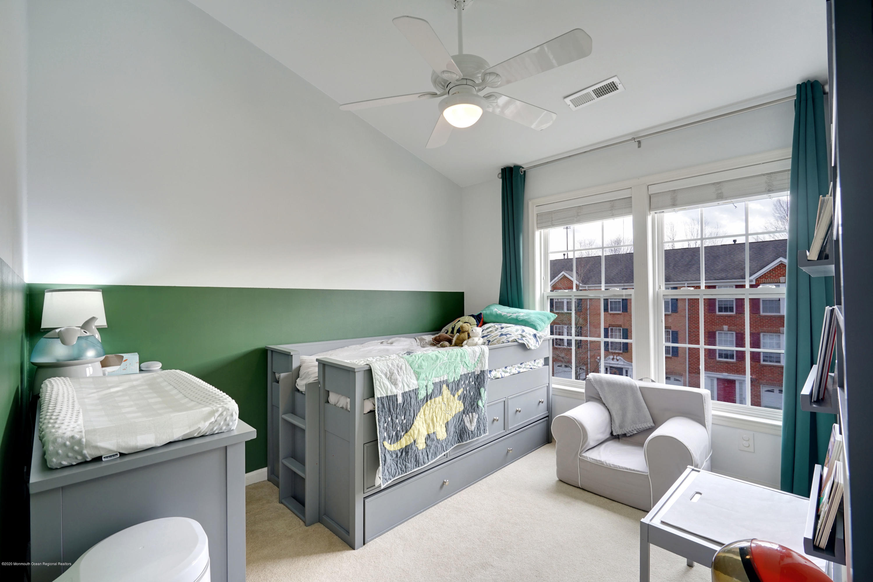 60 Saxton Road, Unit 87 Farmingdale, NJ 07727 - Photo 25 of 38 a bedroom with furniture and a large window