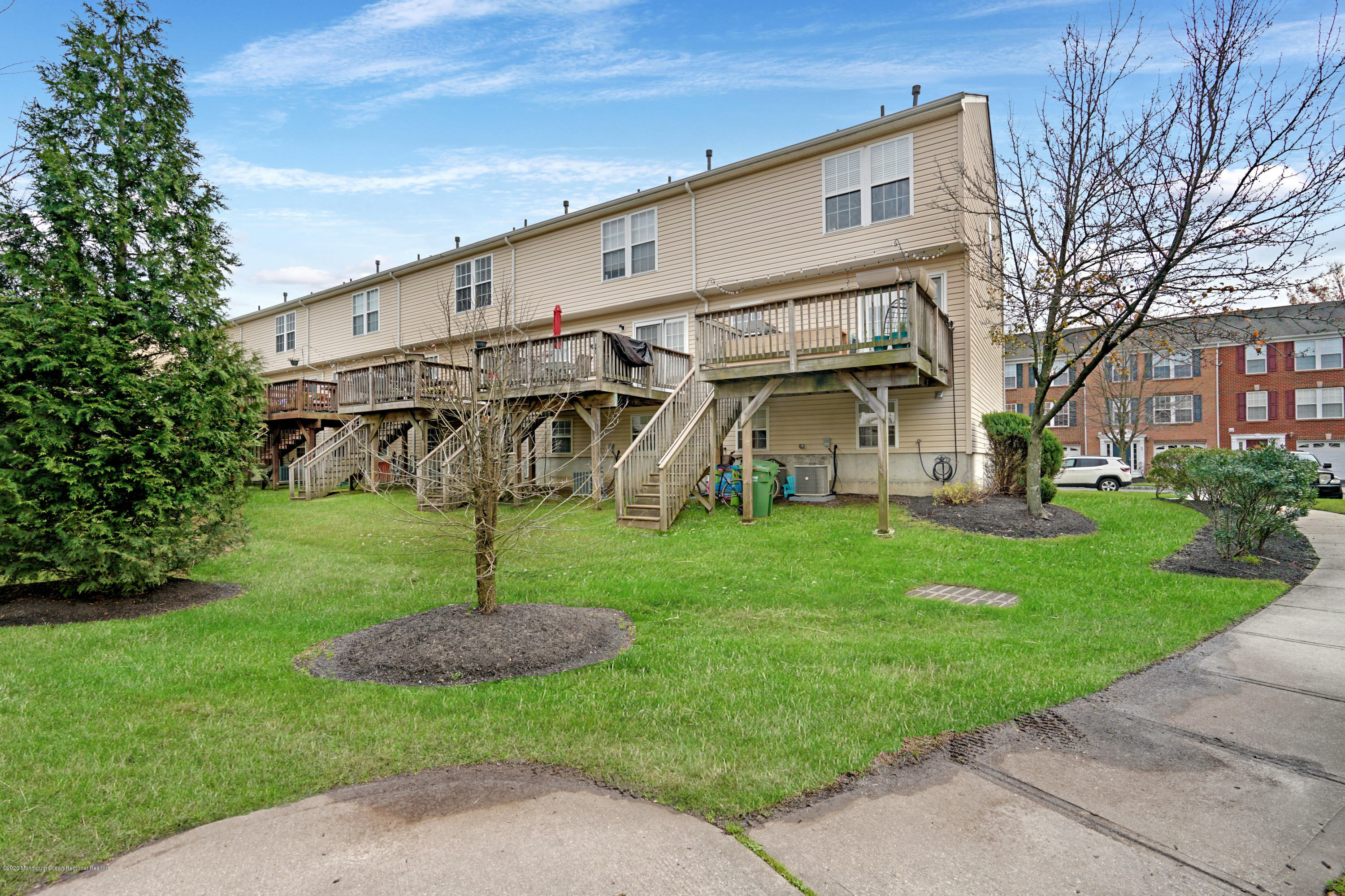 60 Saxton Road, Unit 87 Farmingdale, NJ 07727 - Photo 35 of 38 a view of a house with a yard