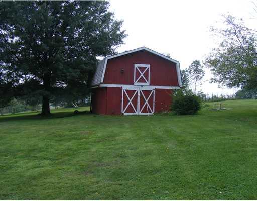 Storage. The two story barn had electric at one time and was used for a workshop.  Now just storage.