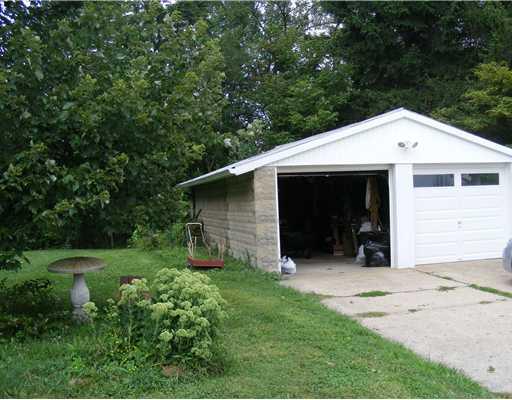 Parking Lot/Garage. Detached garage is just off the rear of the house for your convenience.