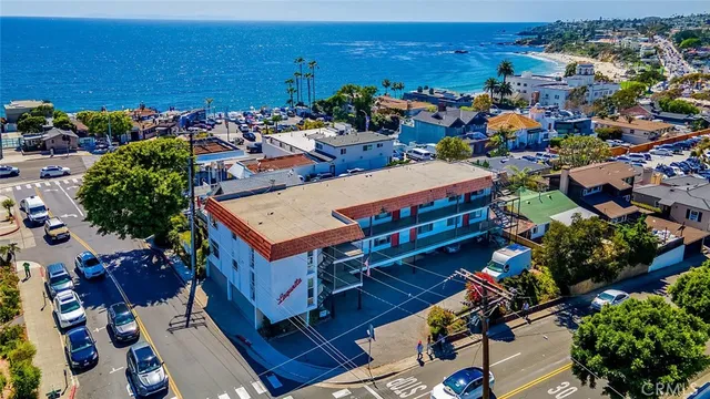 an aerial view of a houses with outdoor space