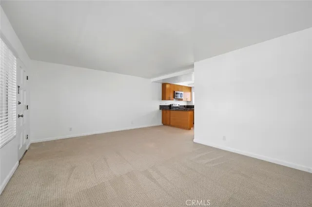 a view of kitchen and utility room