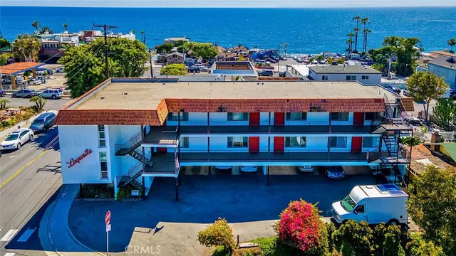 a terrace with outdoor seating and city view