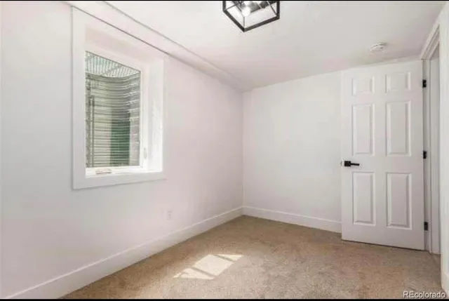 an empty room with a window