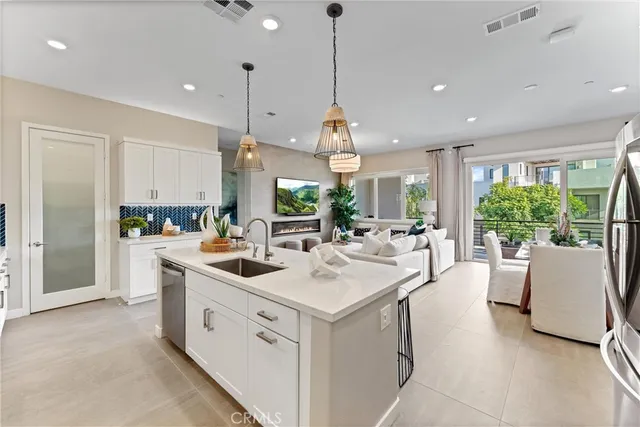 a bedroom with furniture and a large window