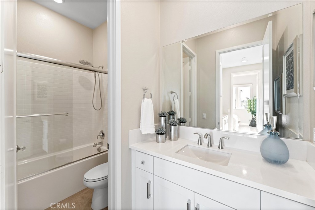 419 Transport Tustin, CA 92782 - Photo 32 of 58 a bathroom with a sink a toilet and shower